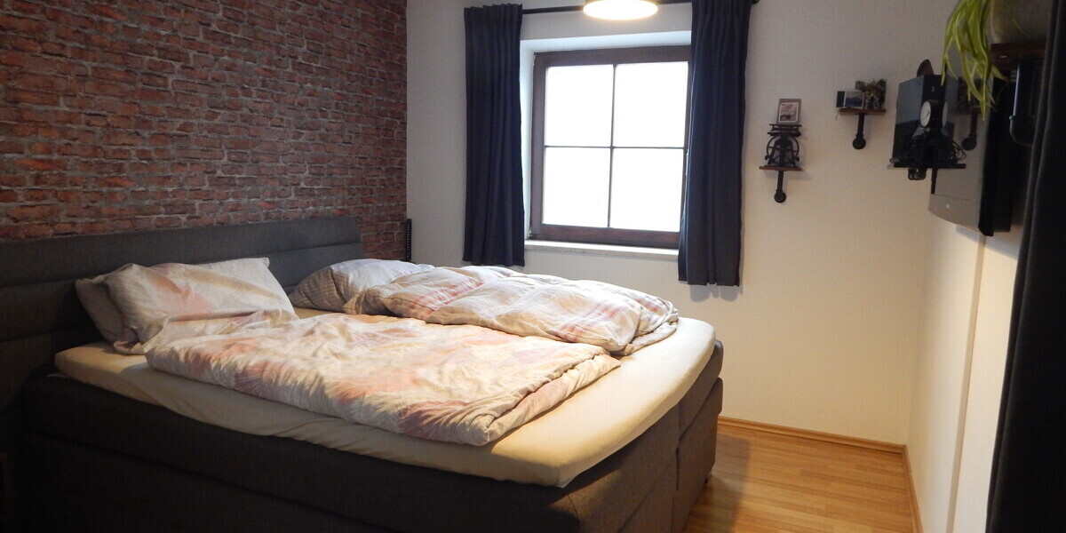 Gepflegte, vermietete 2-Zimmerwohnung mit Garten in Freilassing, Ortsteil Hofham - inkl. TG Platz. - Etagenwohnung Freilassing Freilassing | Angebot:24092328