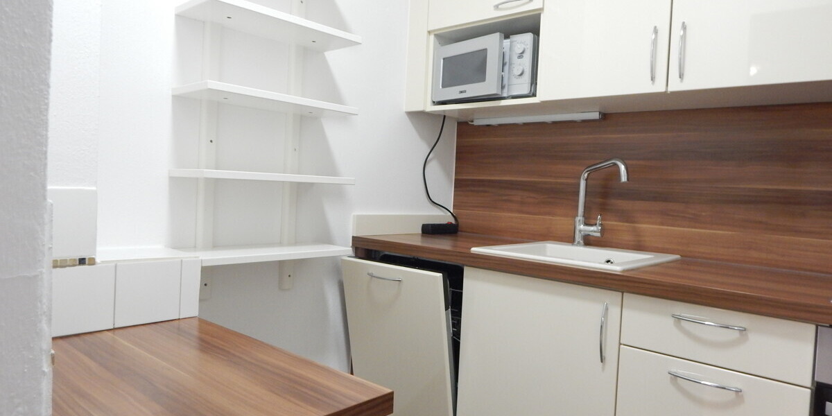2-Zimmer-Wohnung in Freilassing mit Balkon & Holzofen – gepflegt und vermietet - Erdgeschoßwohnung Freilassing Untereichet | Angebot:27453354