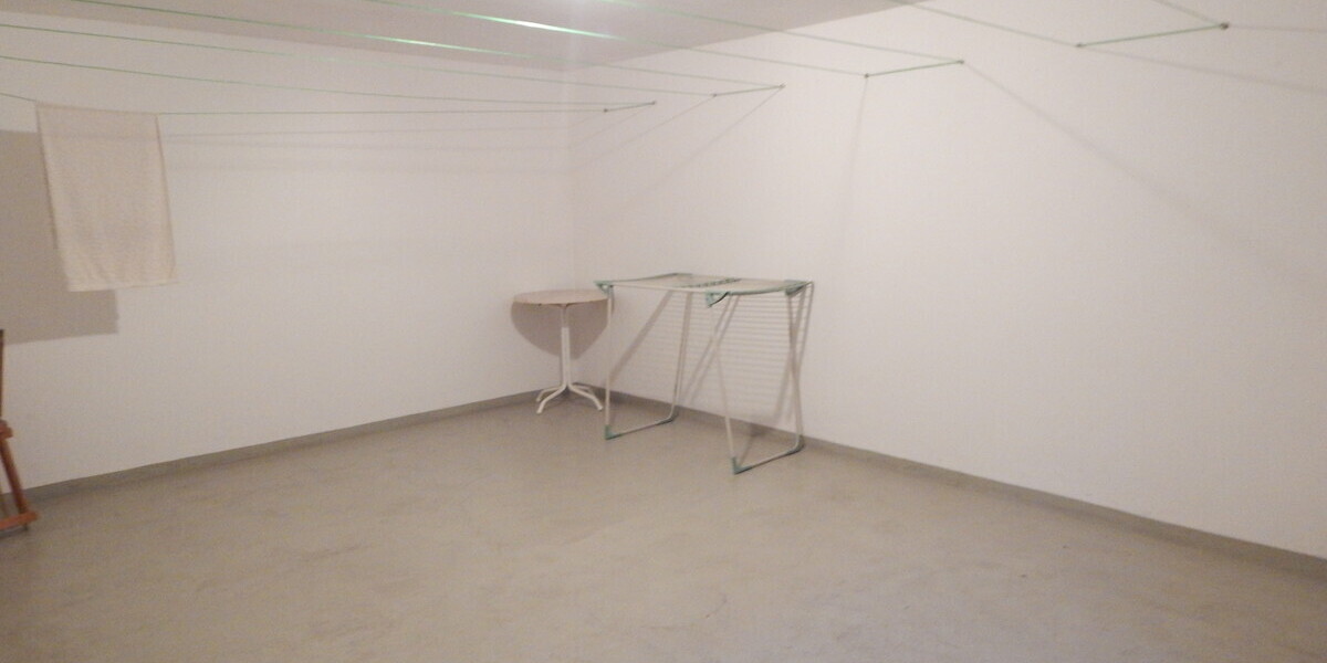 2-Zimmer-Wohnung in Freilassing mit Balkon & Holzofen – gepflegt und vermietet - Erdgeschoßwohnung Freilassing Untereichet | Angebot:27453354