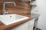 2-Zimmer-Wohnung in Freilassing mit Balkon & Holzofen – gepflegt und vermietet - Erdgeschoßwohnung Freilassing Untereichet | Angebot:27453354